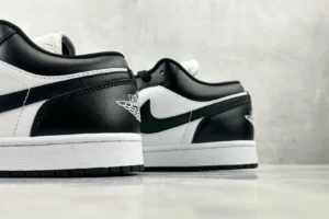 Nike Jordan 1 Low Retro 553558-035 black white leather sneaker with stitched Wings logo on heel
