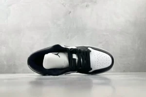 Nike Jordan 1 Retro High OG 555088-010 black and white leather sneakers with perforated toe box