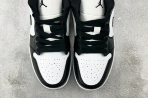 Nike Jordan 1 Retro High OG Style 555088-010 black and white leather sneakers with perforated toe box