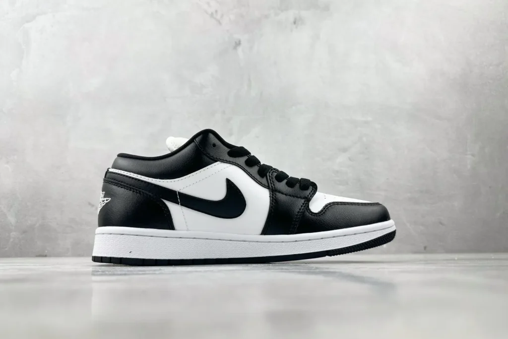 Nike Jordan 1 Low OG 553558-041 black white leather sneaker with black swoosh detailing