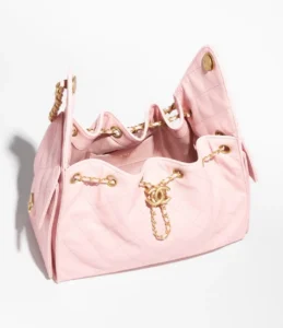 Metal Handle Organ Bag in soft pink with gold chain details, showcasing luxury replica fashion for e-commerce.