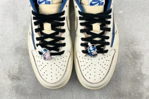 Nike Air Jordan 1 Low OG Travis Scott DJ9649-100 Sail Blue Black leather sneakers with braided lace accents
