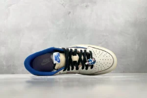 Nike Jordan 1 Retro Low OG Style CZ4776-100 Sail/Black-Royal Blue leather sneaker with braided lace accessory