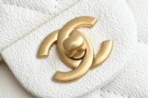 Chanel Classic Flap Bag small white caviar leather with gold-tone metal turn-lock closure