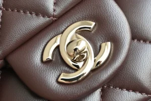 Chanel Classic Flap Bag medium brown quilted leather gold-tone turn-lock closure accessory