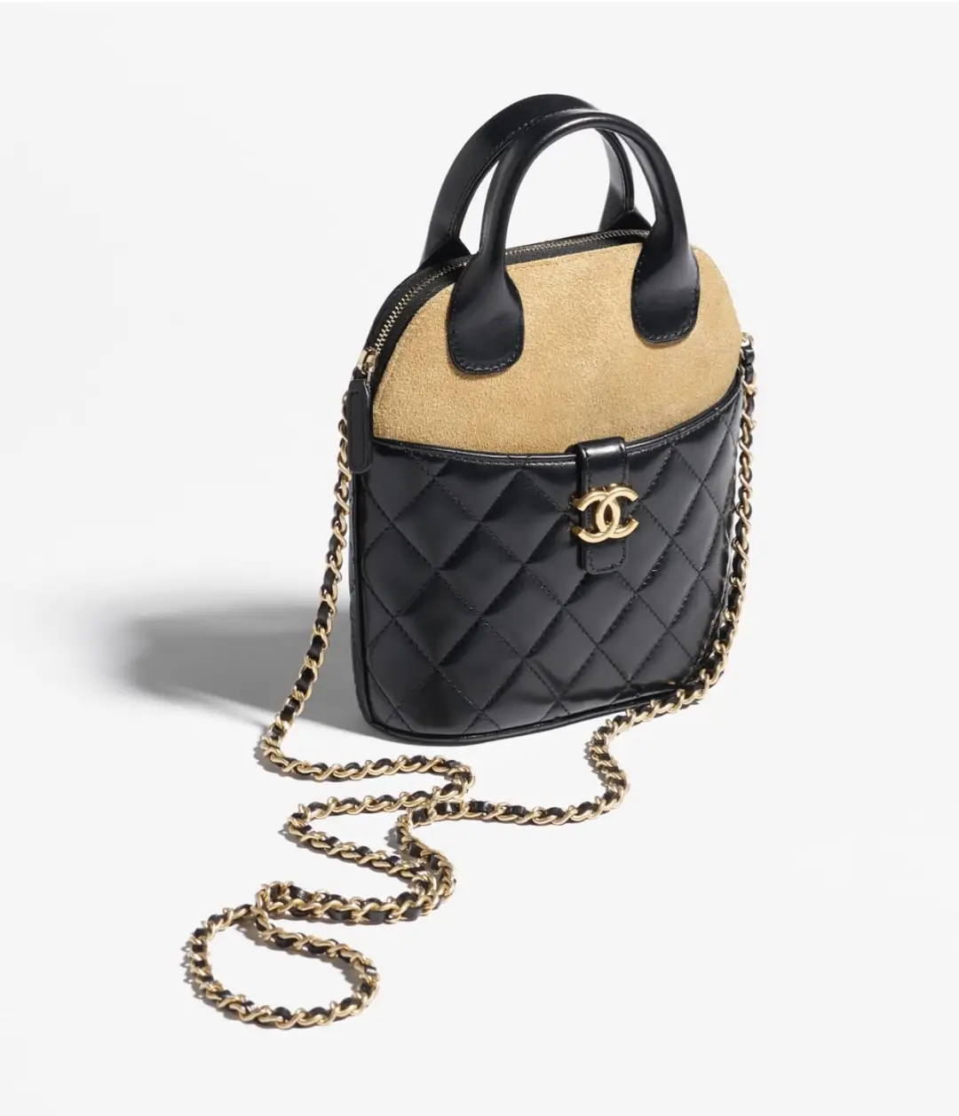 Handmade vertical shell bag featuring suede brown leather with black patchwork and gold chain strap, priced at 9, showcasing luxury craftsmanship.