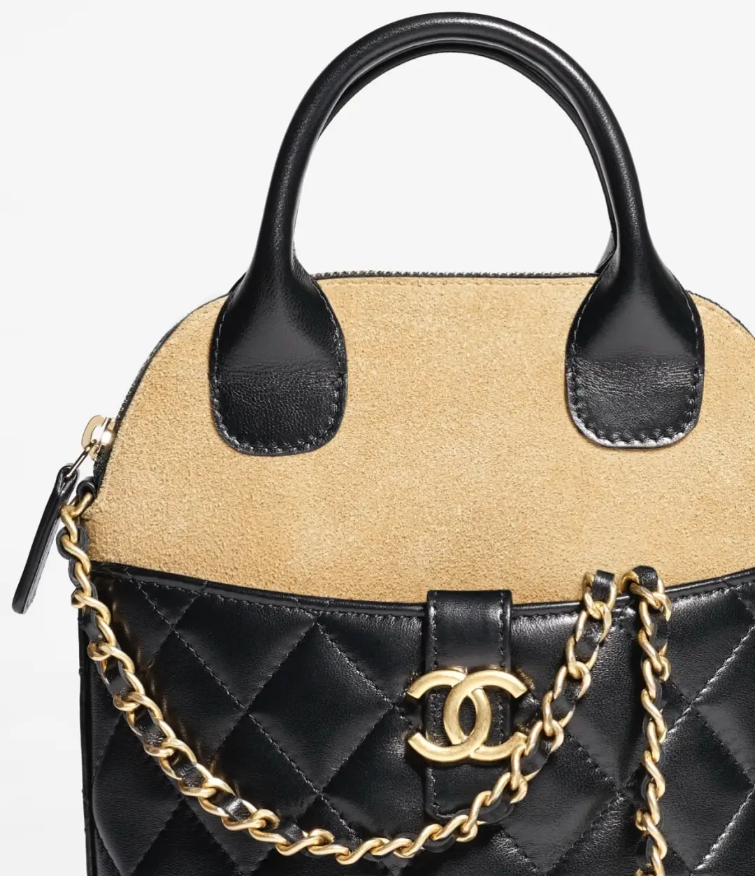 Handmade vertical shell bag featuring suede brown leather and black patchwork, luxurious materials, and gold chain detailing.