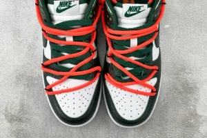 Nike Dunk Low Michigan State green white leather sneakers with orange laces detail