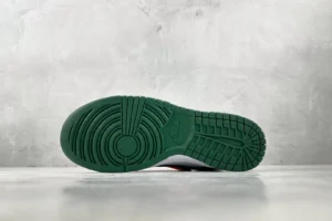 Nike Air Jordan 1 Low pine green outsole rubber sneakers with textured tread pattern