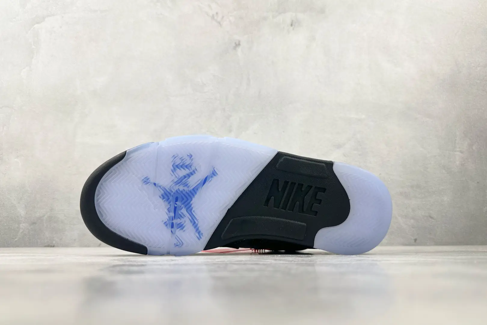 Nike Air Jordan 5 Retro OG Fire Red white black cement leather sneakers with icy sole and Jumpman logo