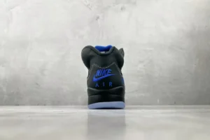 Nike Air Jordan 5 Retro black royal blue leather sneakers with blue embroidered logo and ice sole