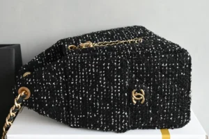 Chanel Classic Flap Medium A01112 black tweed bag with gold-tone chain and logo hardware