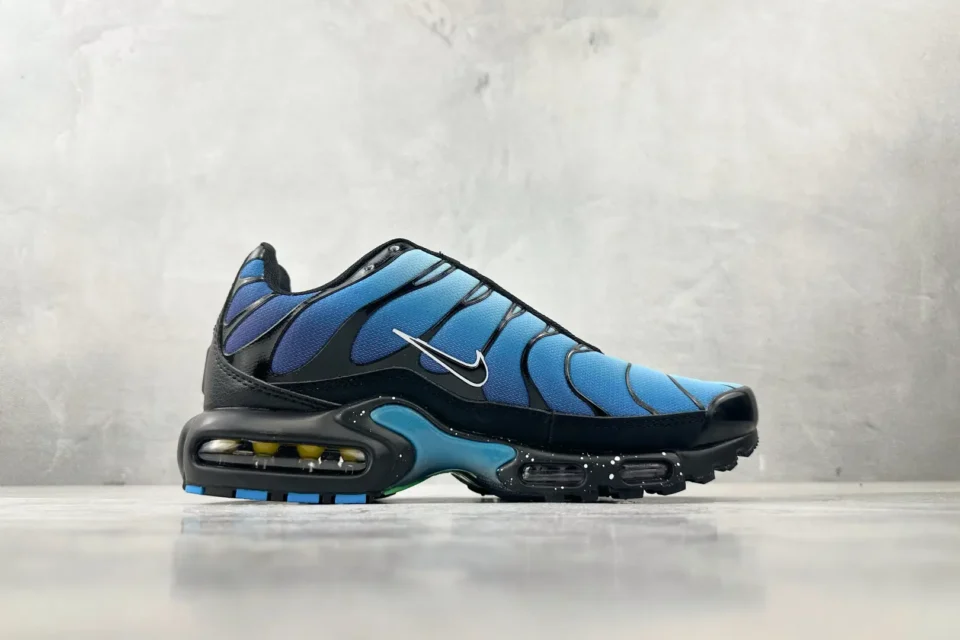 Nike Air Max Plus OG blue black leather mesh sneakers with visible Air cushioning and speckled sole detailing