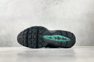 Nike Air Max 95 black aqua blue foam rubber outsole sneakers with visible air cushioning unit