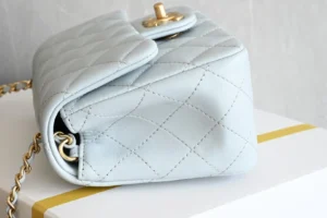 Chanel Classic Flap Mini bag Quilted light blue lambskin leather gold chain closure
