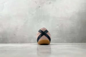 Onitsuka Tiger Mexico 66 pink black suede leather sneakers with gum sole visible from back view