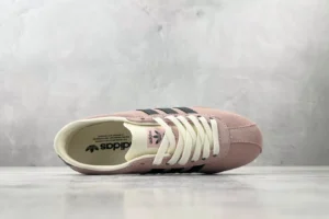 Adidas Gazelle sneakers pink black suede leather with cream laces and logo tongue detail
