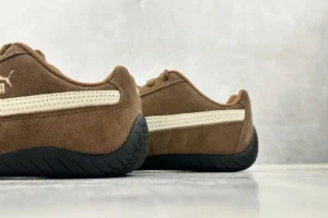 Puma Roma Suede brown beige leather sneakers with black rubber sole and white stripe detail