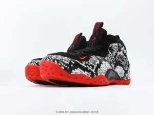 Nike Air Flightposite 1 black white red foamposite sneakers with bright red outsole and mesh upper