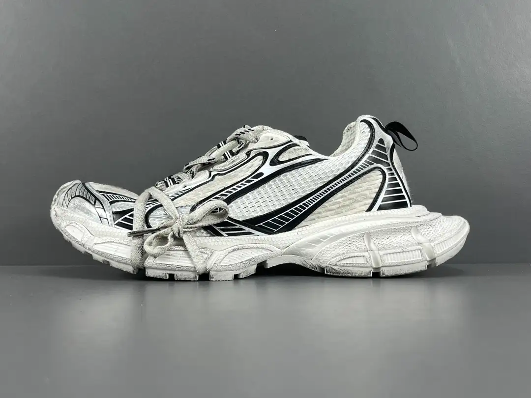 Balenciaga in white, black, and silver. Balenciaga 3XL mesh lace up is worn out