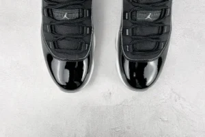 Nike Air Jordan 11 Retro black white patent leather mesh sneakers with translucent sole