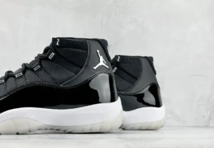 Nike Air Jordan 11 Retro black white patent leather sneakers with translucent sole