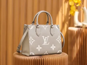 Louis Vuitton OnTheGo MM tote bag grey white leather monogram pattern with top handles and detachable strap