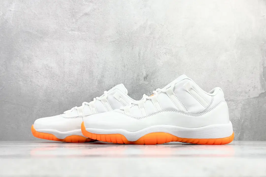 Air Jordan 11 Low white orange outsole leather sneakers