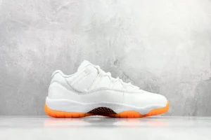 Nike Air Jordan 11 Retro Low white orange leather sneakers with carbon fiber detailing