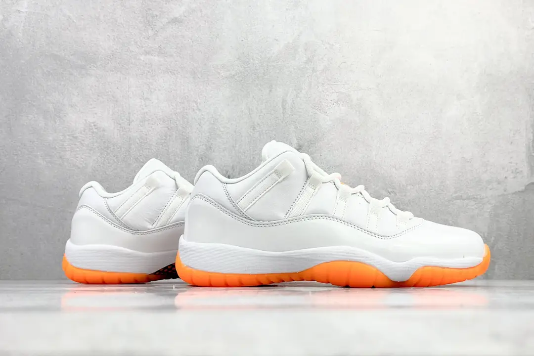 Air Jordan 11 Low sneakers white orange outsole leather and mesh material