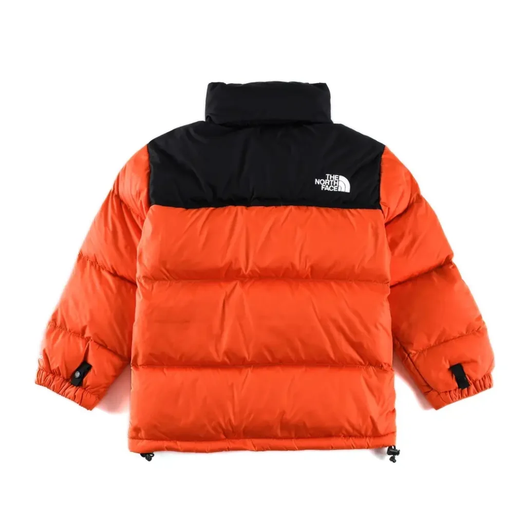 The North Face Nuptse Jacket NF0A4QYX8GN orange black puffer jacket made from durable nylon material