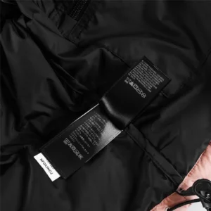 North Face jacket NF0A3N0J black pink nylon material with inner care label and drawstring detail