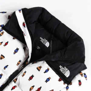 The North Face Fusion 140 puffer jacket white color with colorful bear print nylon material