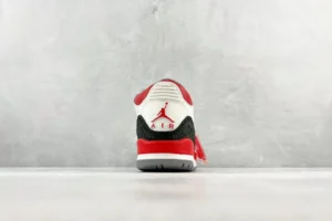 Nike Air Jordan 3 Retro red white black leather sneakers with elephant print detailing and rubber sole