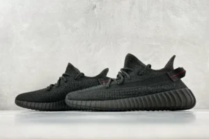 Adidas Yeezy Boost 350 V2 black colorway Primeknit sneakers with ribbed rubber sole