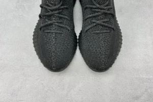 Adidas Yeezy Boost 350 V2 Core black Primeknit fabric sneakers with ribbed rubber sole