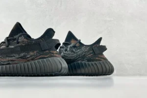 Adidas Yeezy Boost 350 V2 carbon copper reflective knit sneakers with ribbed rubber sole