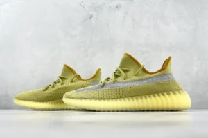 Adidas Yeezy Boost 350 V2 Citrin yellow Primeknit sneakers with translucent rubber sole