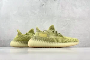 Adidas Yeezy Boost 350 V2 Semi Frozen Yellow knit sneakers with translucent rubber sole