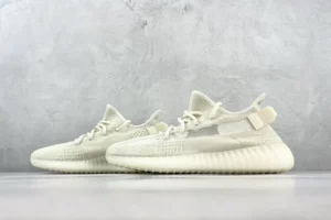 Adidas Yeezy Boost 350 V2 cream white Primeknit sneakers with ribbed outsole and translucent stripe
