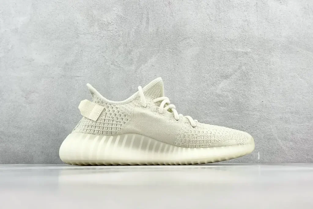 Adidas Yeezy Boost 350 V2 cream white knit fabric sneakers with ribbed sole design