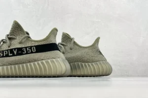 Adidas Yeezy Boost 350 V2 sesame tan black Primeknit sneakers with ribbed rubber sole