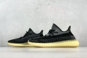 Adidas Yeezy Boost 350 V2 charcoal black gray Primeknit sneakers with semi-translucent yellow sole