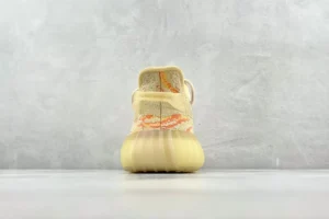 Adidas Yeezy Boost 350 V2 Citrin orange cream knit fabric sneakers with translucent sole