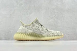 Adidas Yeezy Boost 350 V2 Sesame beige primeknit sneakers with ribbed sole rubber outsole