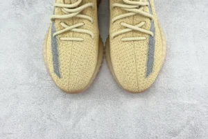 Adidas Yeezy Boost 350 V2 Citrin reflective knit sneakers with translucent rubber sole