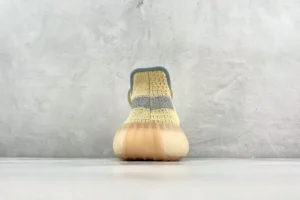 Adidas Yeezy Boost 350 V2 Sulfur cream yellow knit sneakers with gum rubber sole