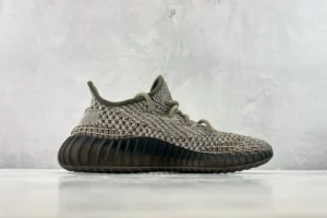Adidas Yeezy Boost 350 V2 earth tone brown primeknit knit sneakers with black ribbed rubber sole