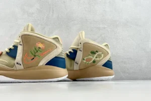 Nike Kyrie 8 Infinity EP replica sneakers featuring floral and leafy embroidery, showcasing a beige upper with blue accents, against a neutral background.