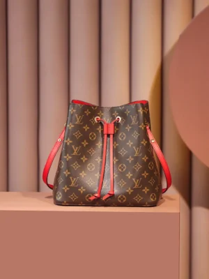 Louis Vuitton NéoNoé PM M44022 monogram canvas bucket bag with red leather accents and drawstring closure